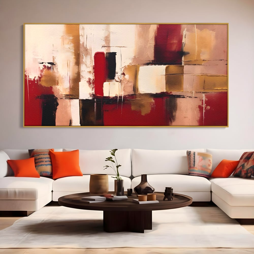 Tablou canvas cu pictura abstracta cu patrate rosii si bej, in rama de aluminiu auriu, pe perete intr-un living